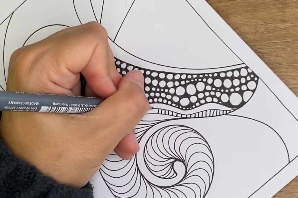 Creating Intricate Abstract Designs with Zentangle Patterns
